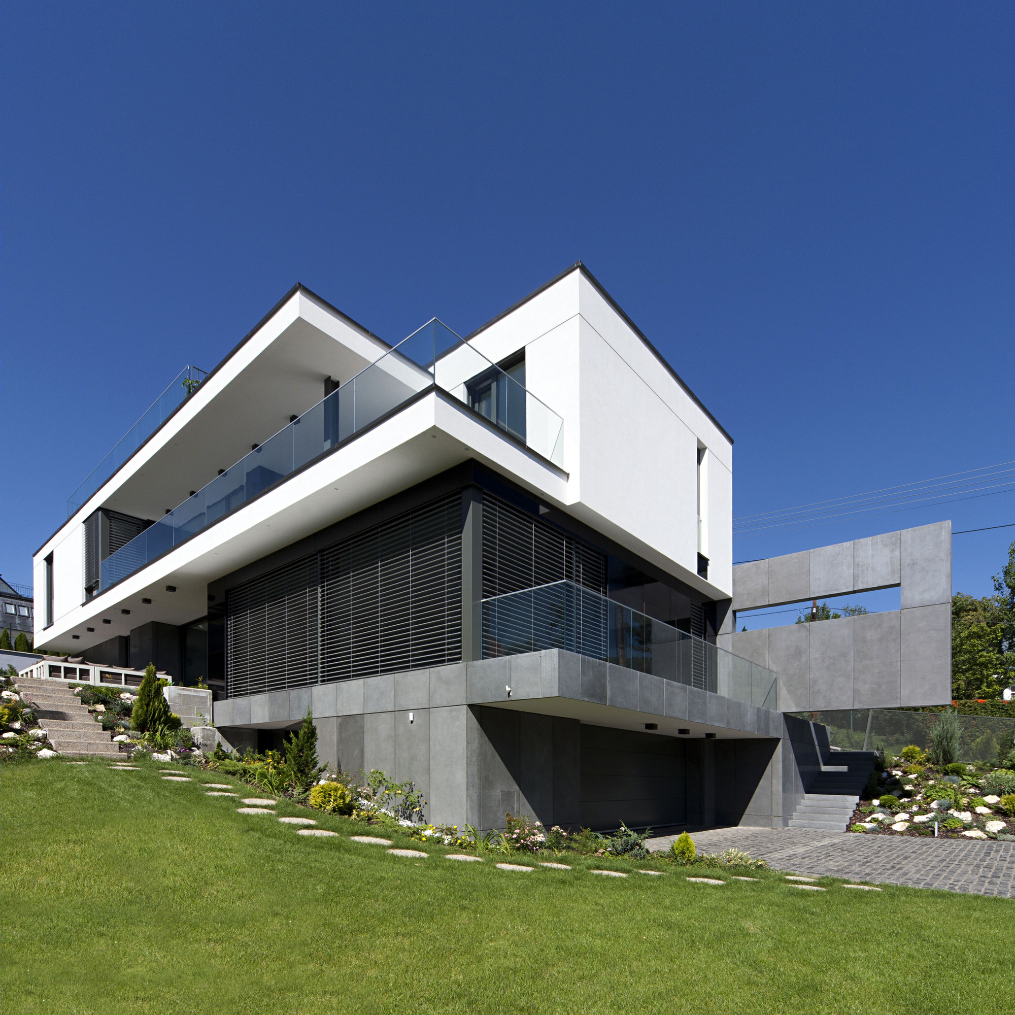 托斯建筑事务所丨悬浮块别墅丨简约精致-12