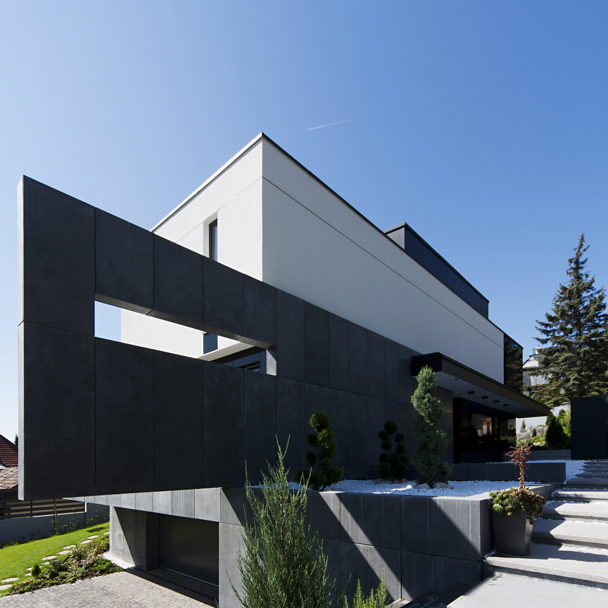 托斯建筑事务所丨悬浮块别墅丨简约精致-13