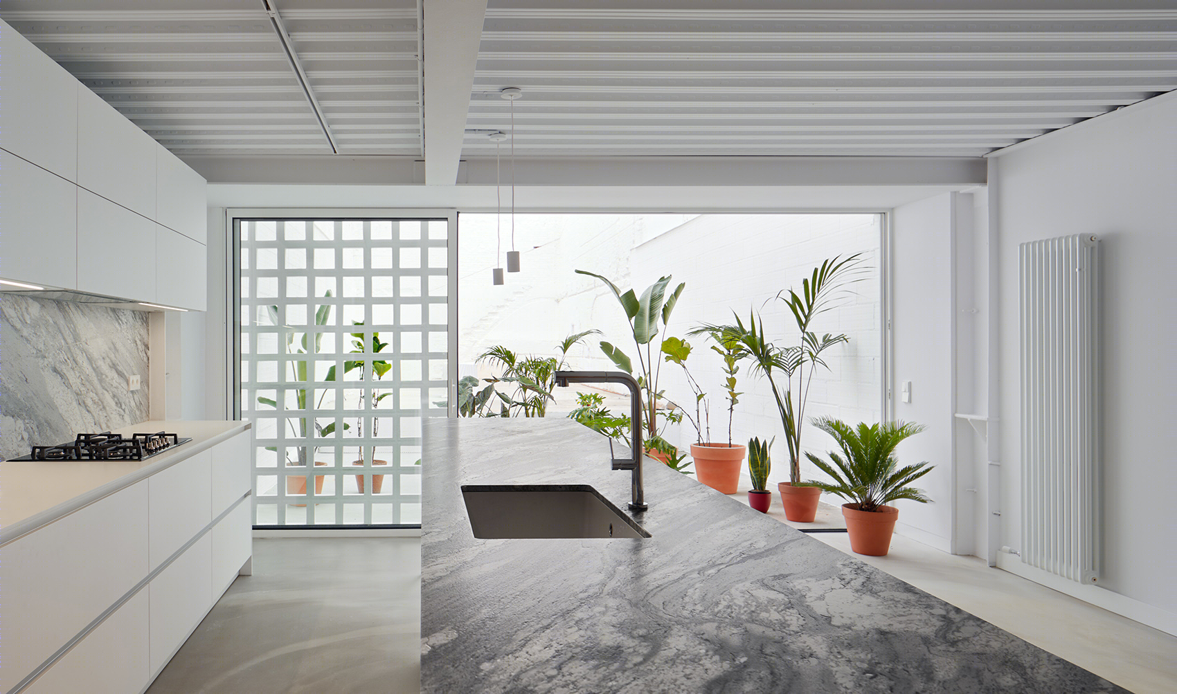 隔墙间的住宅，巴塞罗那/将工业厂房改造成城市绿洲-23