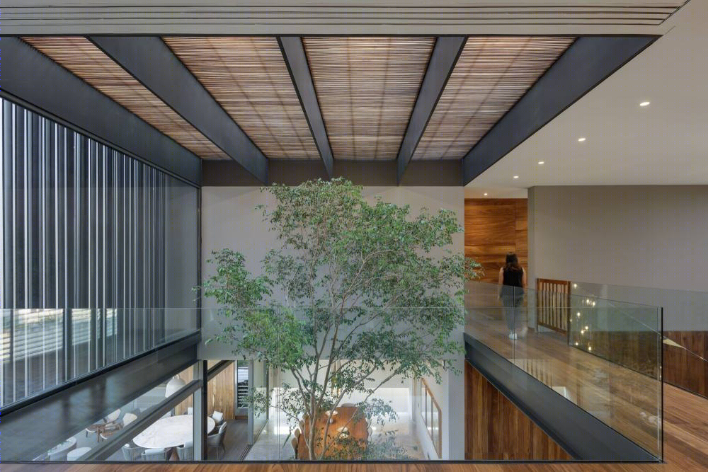 墨西哥"Dos 之家" | 融入街角的透明空隙设计-17