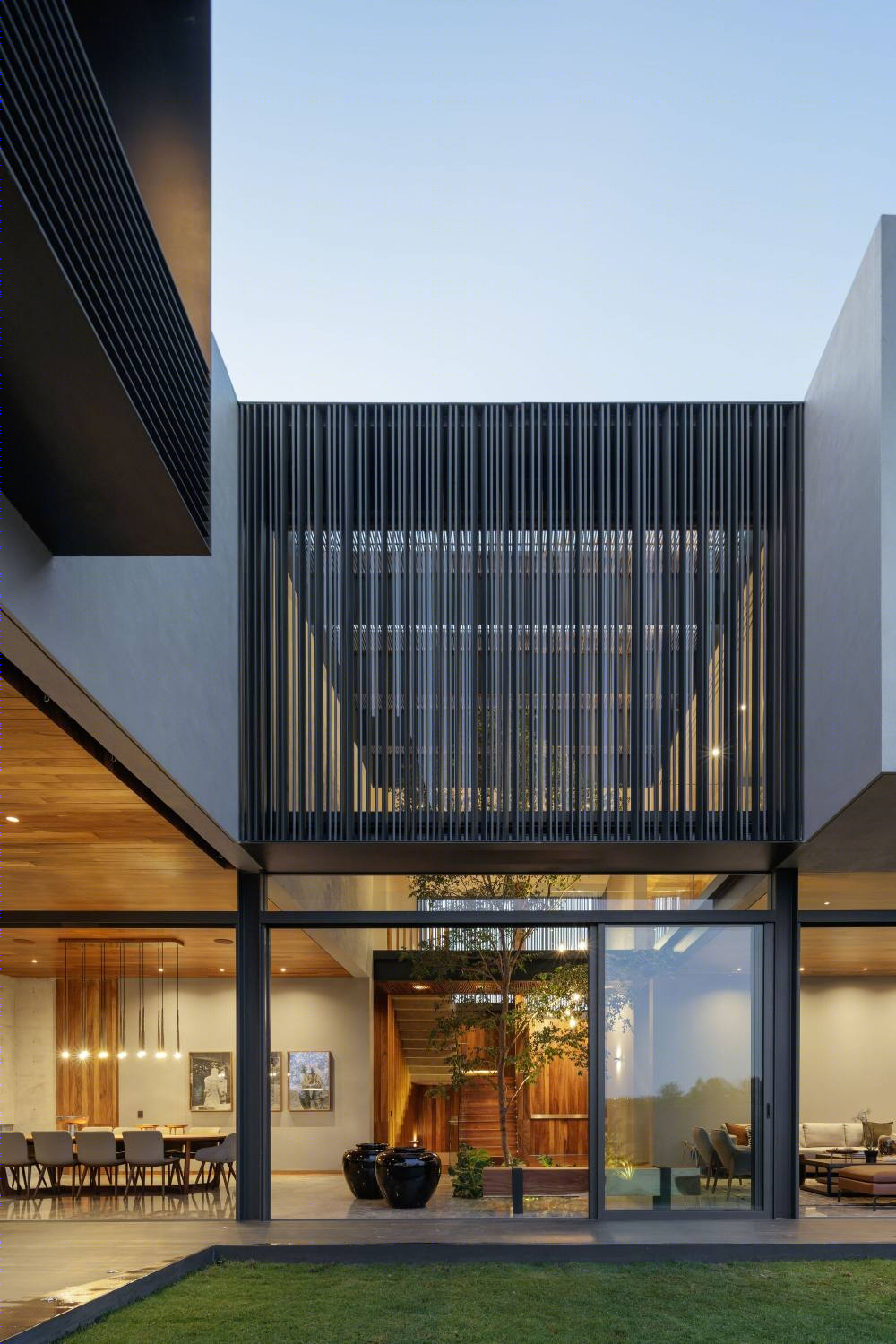 墨西哥"Dos 之家" | 融入街角的透明空隙设计-21