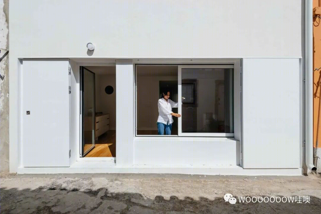 里斯本 Rua Bartolomeu Dias 住宅,翻新扩建的现代魅力-8