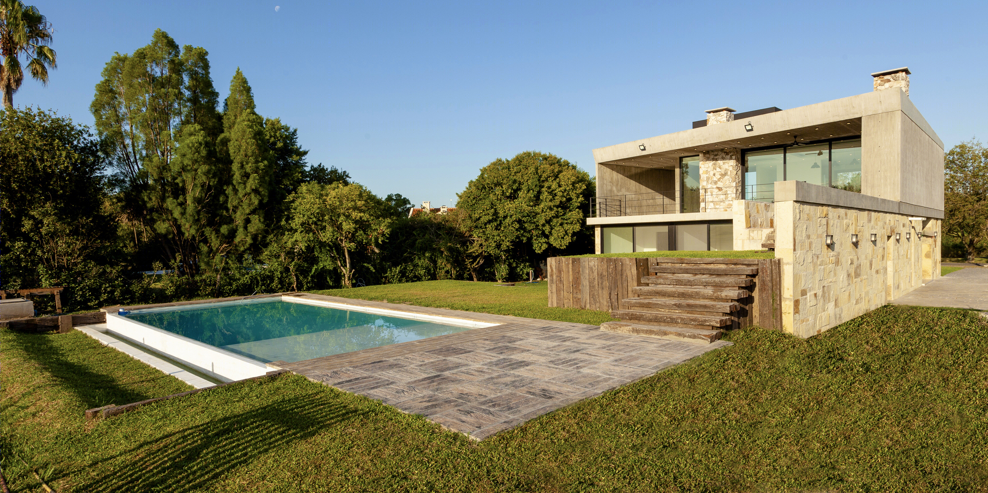 阿根廷 Golf House 别墅，高差地形上的优雅空间-23