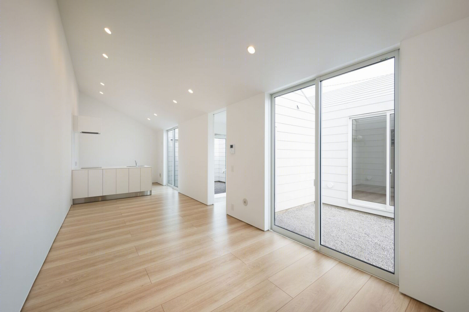 Toru kashihara Architects 打造日本 Numata 木质连栋住宅 | 极简风格与室内庭院设计-6