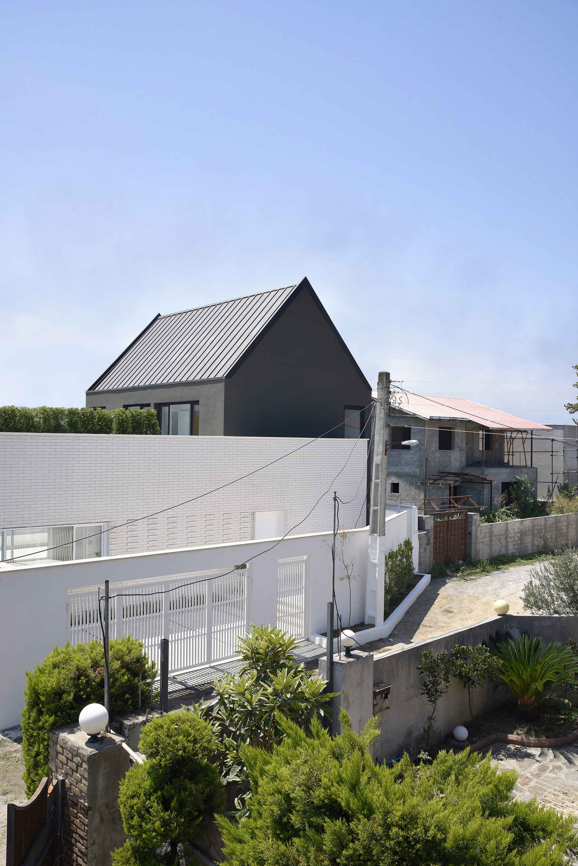 伊朗 Afra House | 自然光与绿意融入简约空间的宗教隐私设计-21