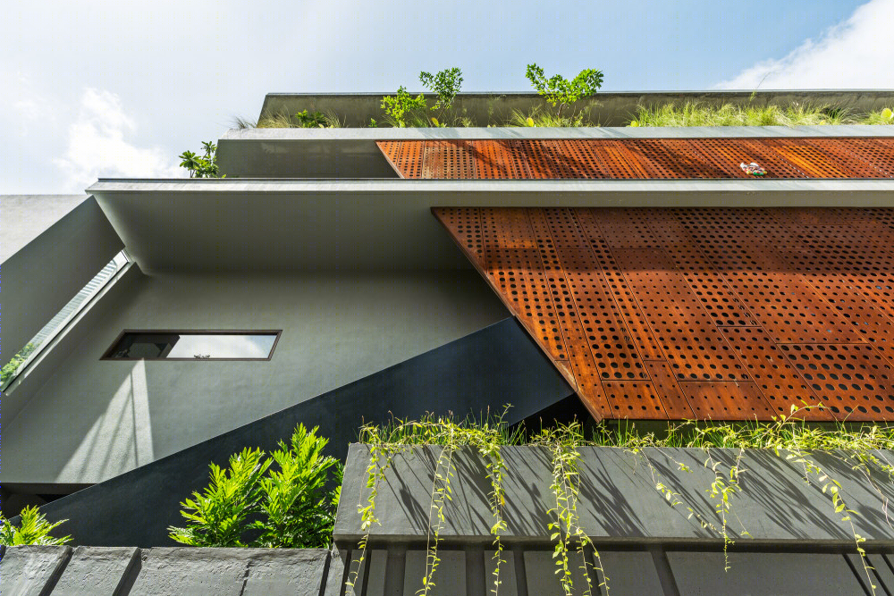 班加罗尔“隐身”三角住宅设计-11